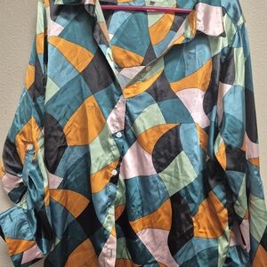 long-sleeve button-down shirt from the brand White Rhino. 